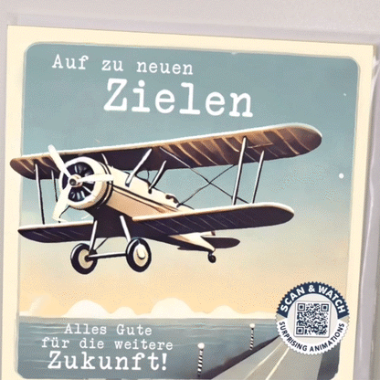 animierte Grußkarte. Zeigt Animation einer Video-Grußkarte. Ein Flugzeug fliegt aus der Karte und sagt "Auf zu neuen Zielen" und am Ende blendet der Text "Alles Gute" ein.
